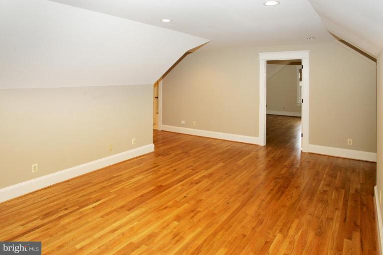 7205 Ridgewood Avenue Chevy Chase, MD 20815 - Photo 15 of 27 4th floor area and bedroom