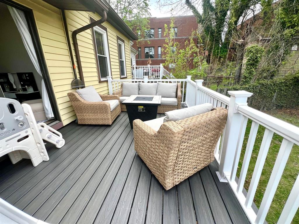 237 Lelia Street Pittsburgh, PA 15211 - Photo 25 of 46 a balcony with wooden floor and furniture