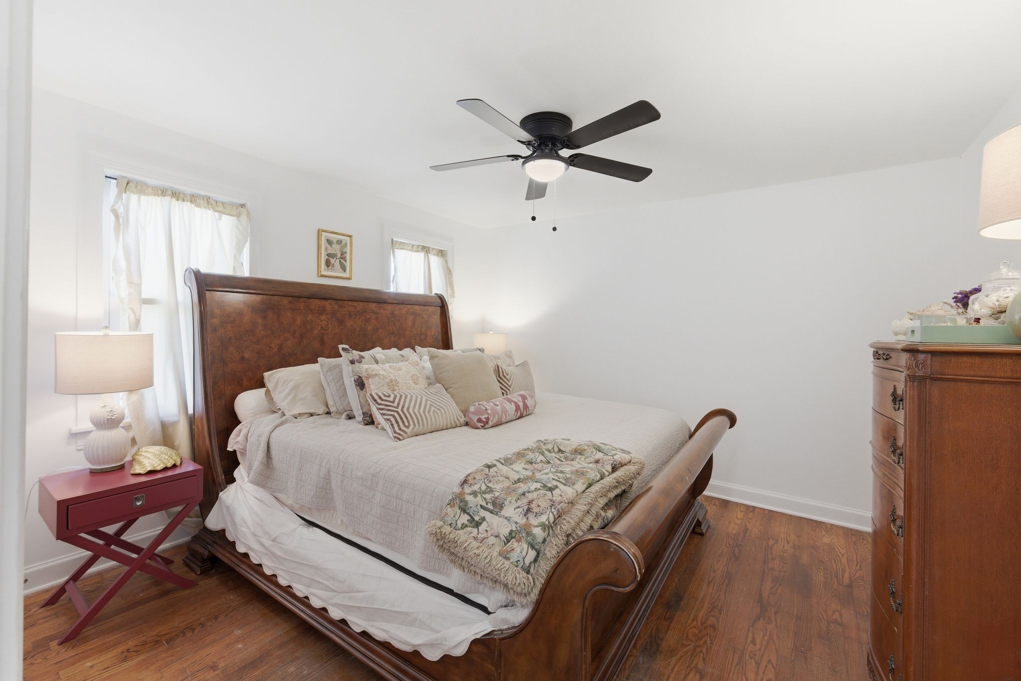 926 Idlewild Drive Madison, TN 37115 - Photo 11 of 25 a bedroom with a bed and wooden floor