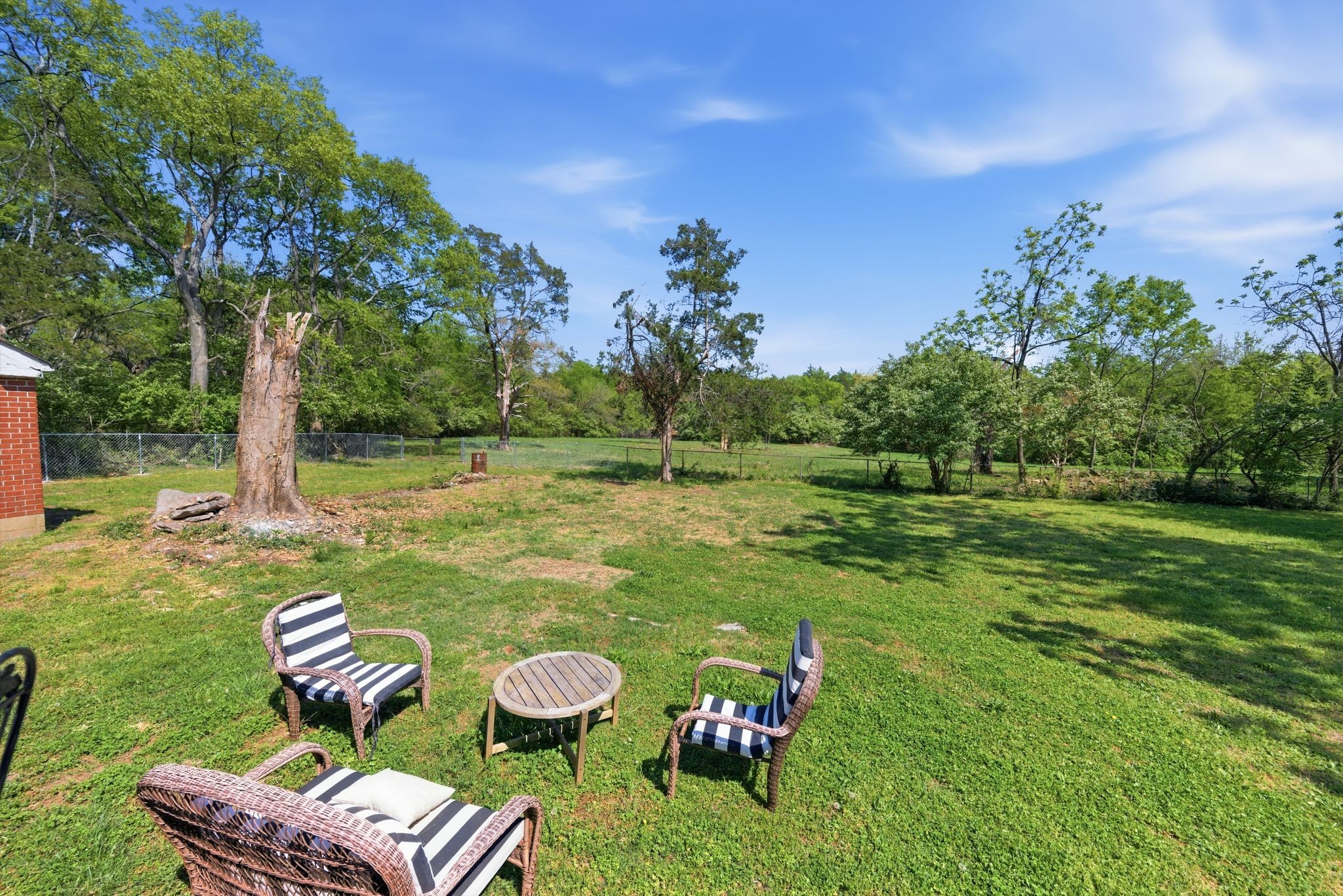 926 Idlewild Drive Madison, TN 37115 - Photo 23 of 25 a view of a chair and table in the garden