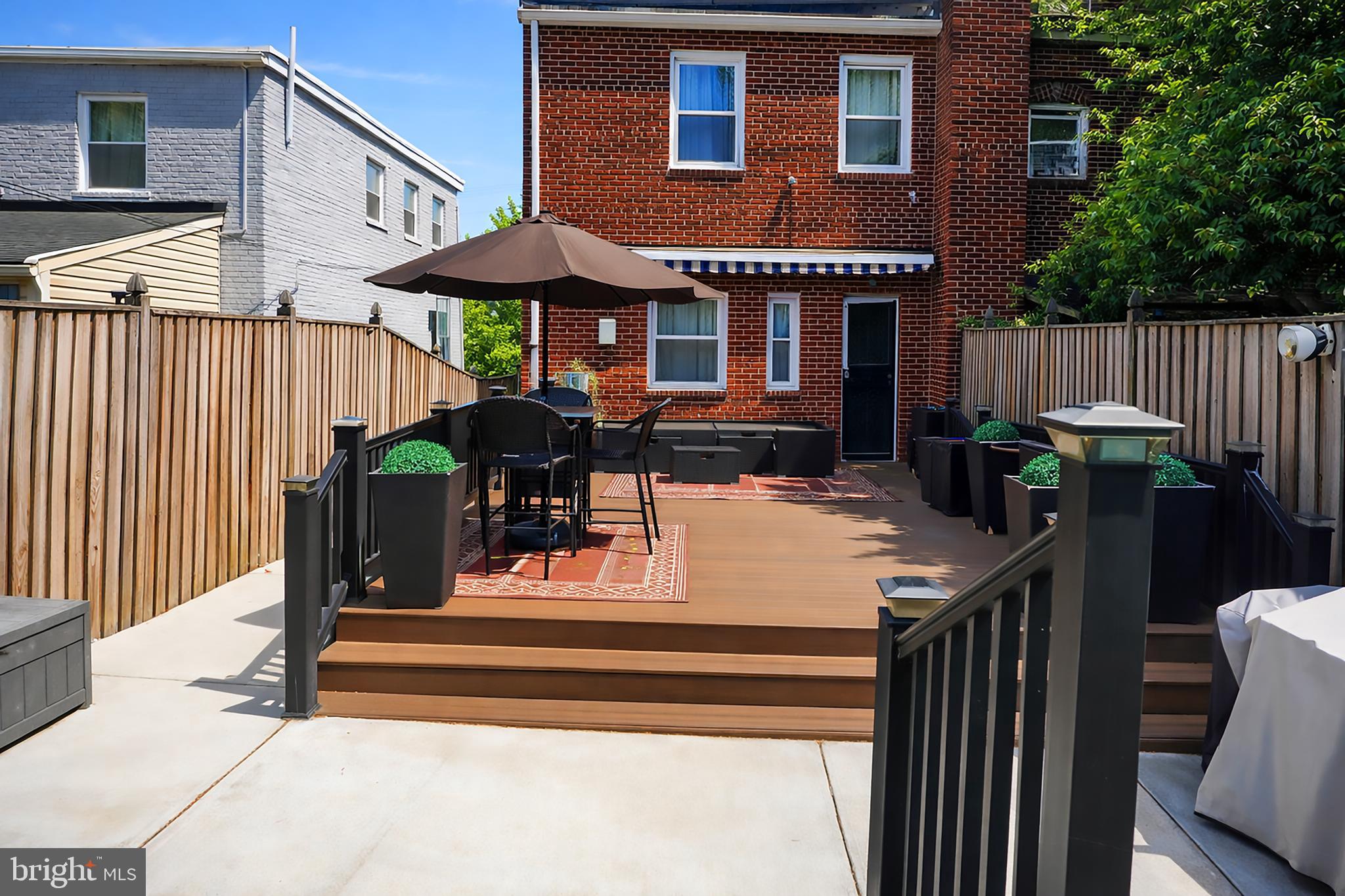 3935 Clay Place Northeast Washington, DC 20019 - Photo 1 of 17 a view of a house with backyard and sitting area