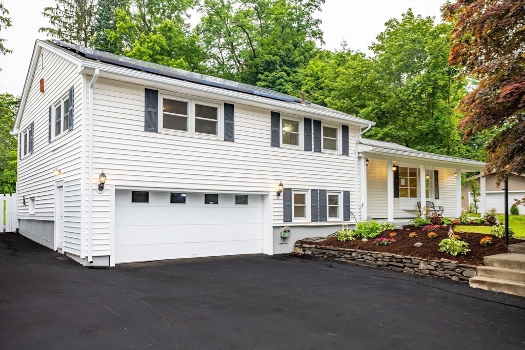a front view of a house with a patio