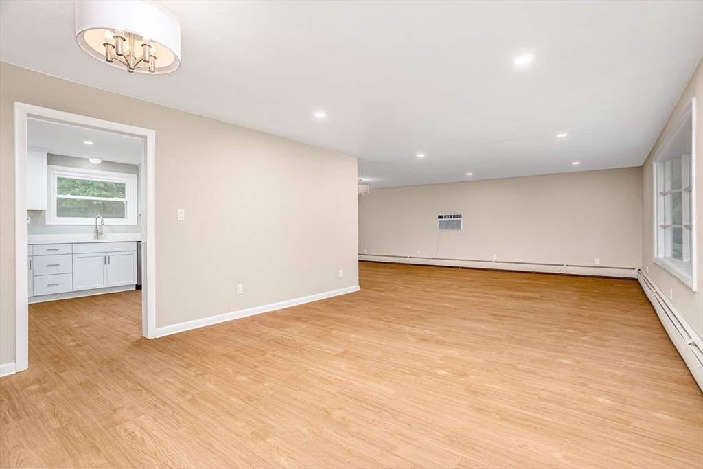 477 Salisbury Street Worcester, MA 01609 - Photo 7 of 42 an empty room with a empty space and a window