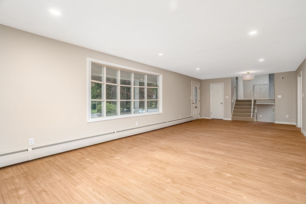 477 Salisbury Street Worcester, MA 01609 - Photo 10 of 42 a view of an empty room with a window