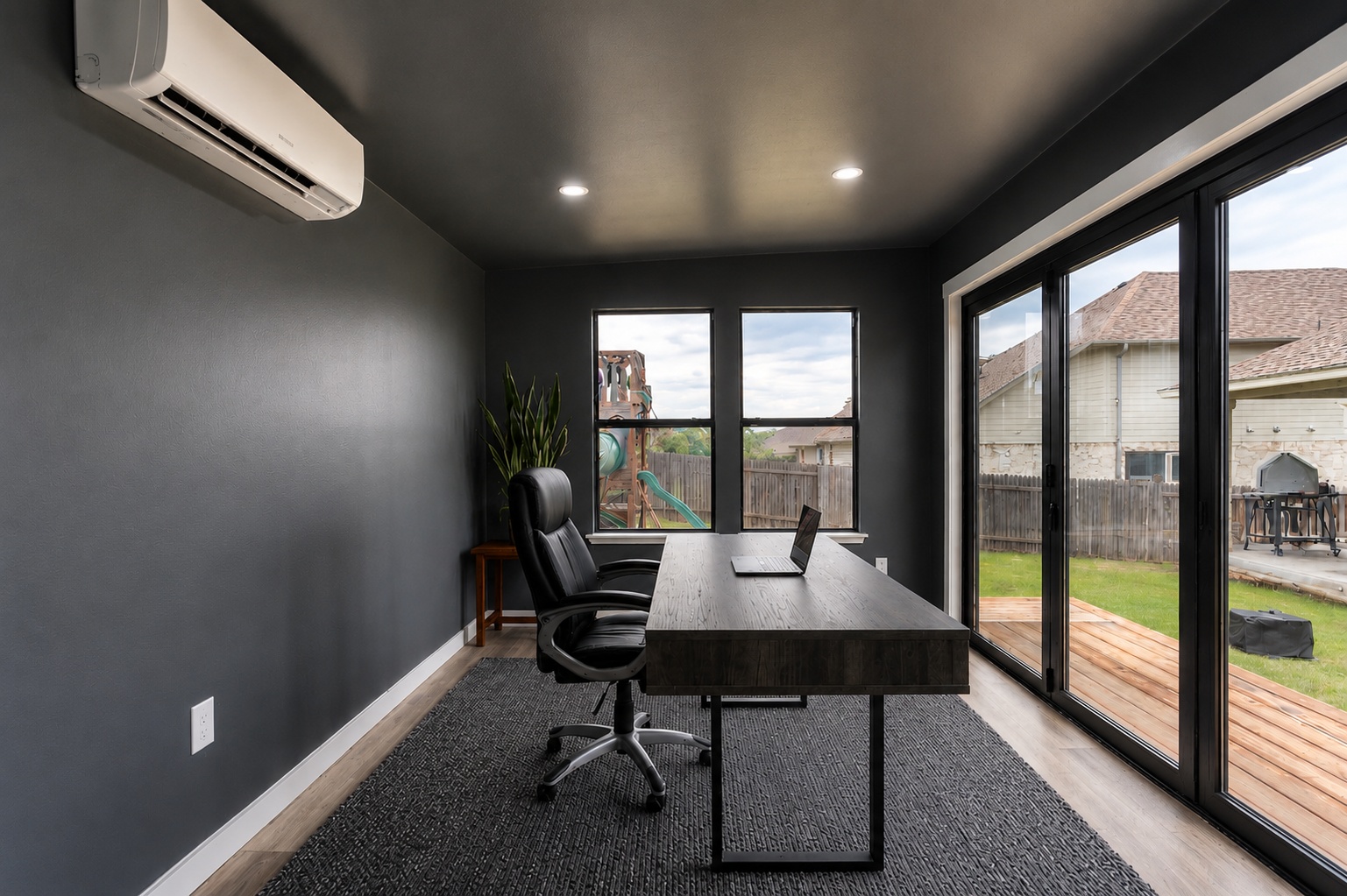 212 Sierra Blanca Road Dripping Springs, TX 78620 - Photo 5 of 35 a view of a workspace with furniture and a window