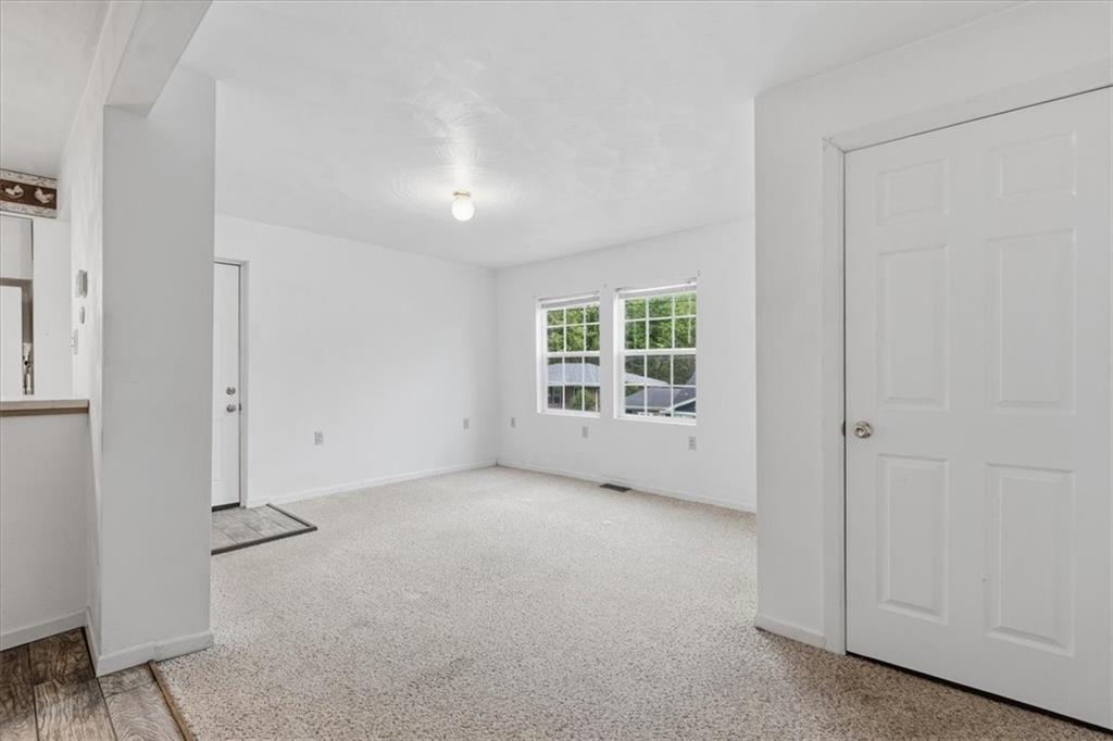 470 Reidmore Road Connellsville, PA 15425 - Photo 17 of 29 an empty room with windows