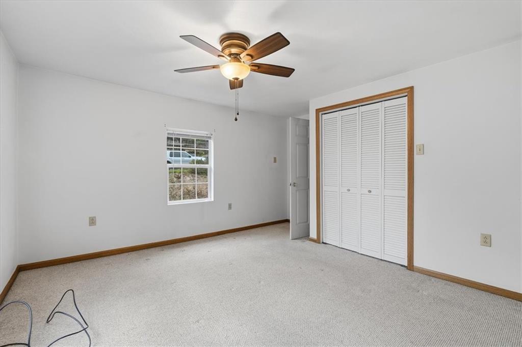 470 Reidmore Road Connellsville, PA 15425 - Photo 21 of 29 a view of an empty room with chandelier fan