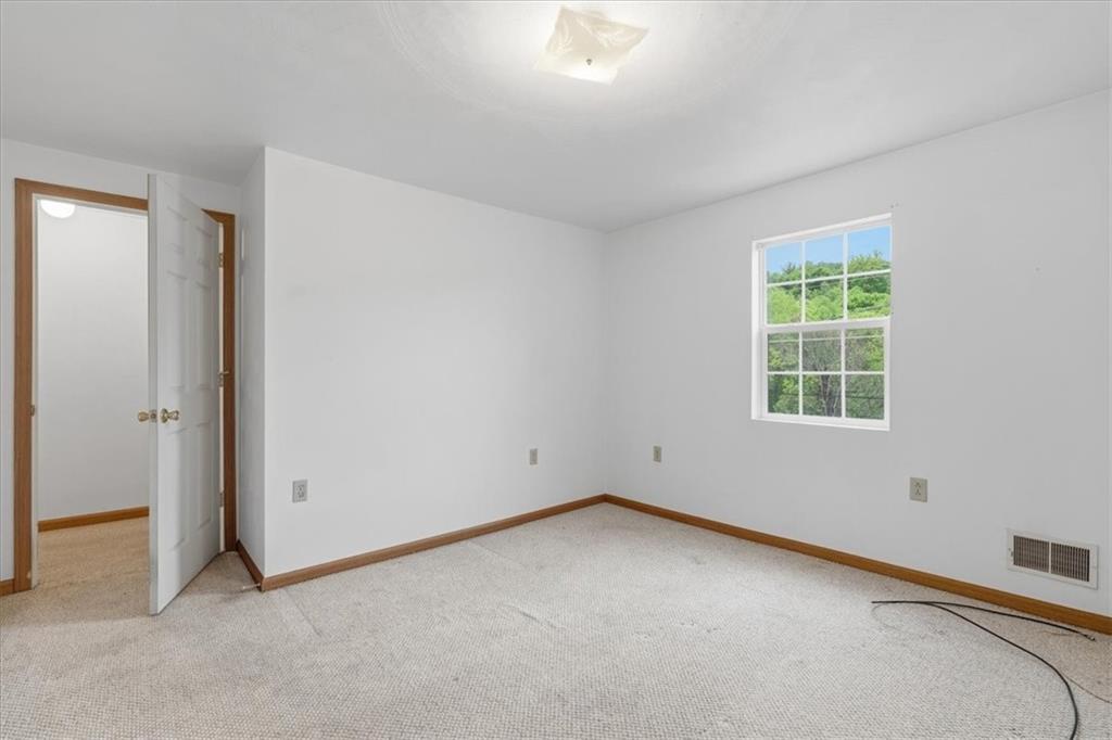 470 Reidmore Road Connellsville, PA 15425 - Photo 24 of 29 an empty room with a window