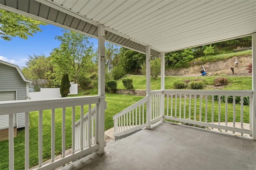 470 Reidmore Road Connellsville, PA 15425 - Photo 8 of 29 a view of a deck with a large window and yard