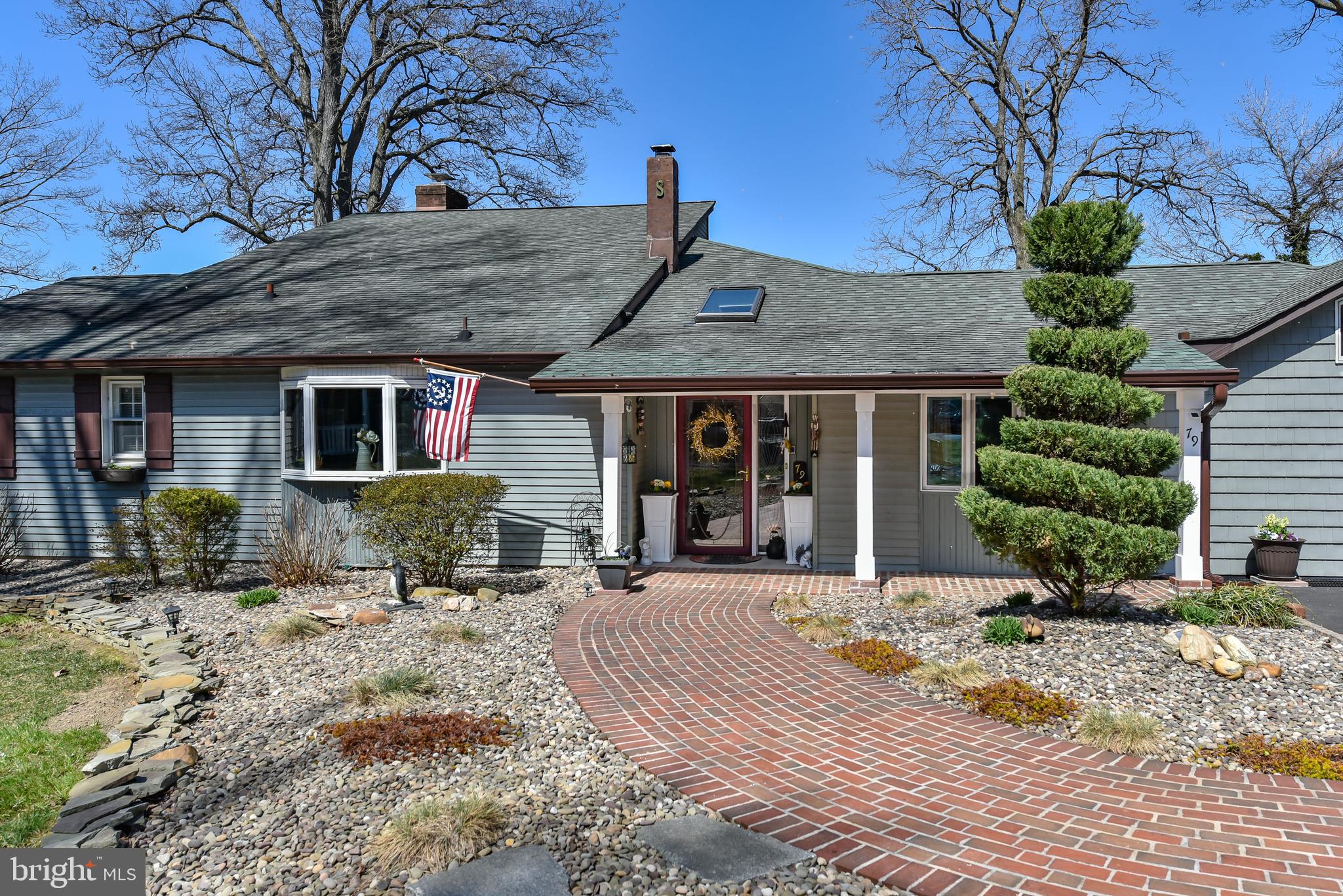 79 Knollwood Road Elkton, MD 21921 - Photo 10 of 40 shows new brick walkway-vinyl shake siding on part