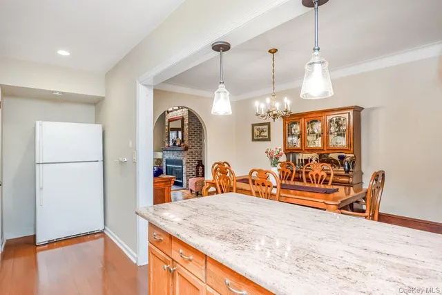 a view of a living room and kitchen