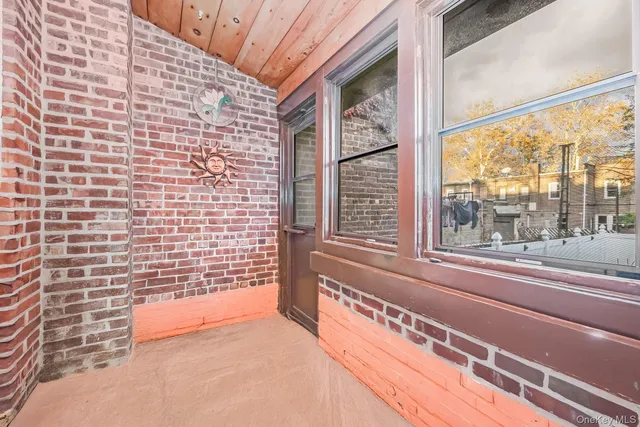 a view of a bathtub in a window