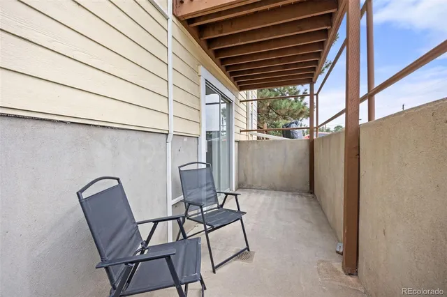 a view of chair and table in the patio