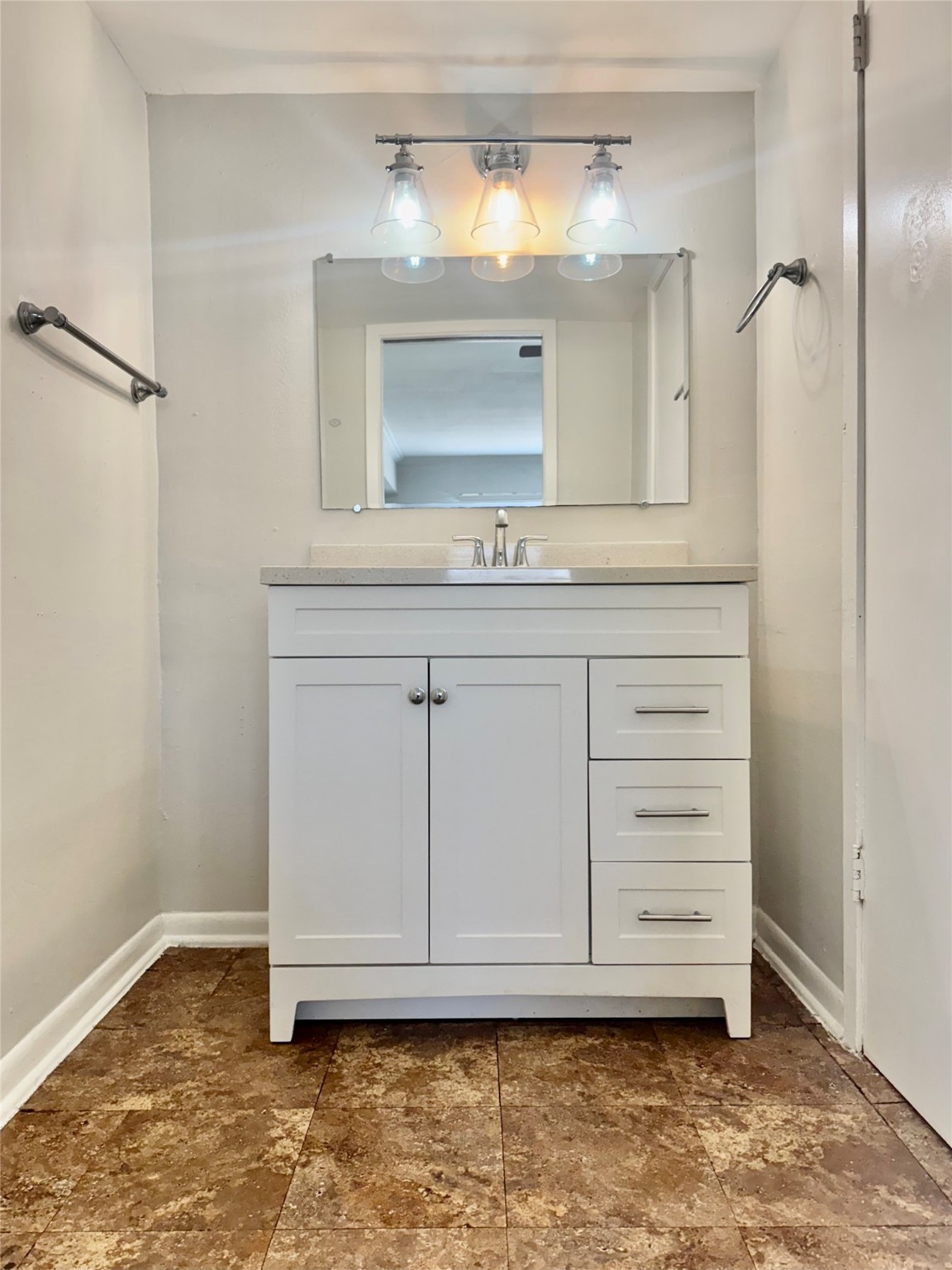 2006 Sul Ross Street, Unit 5 Houston, TX 77098 - Photo 8 of 13 a bathroom with a sink a vanity and a mirror