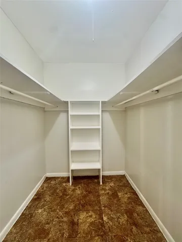 a view of a room with an empty space