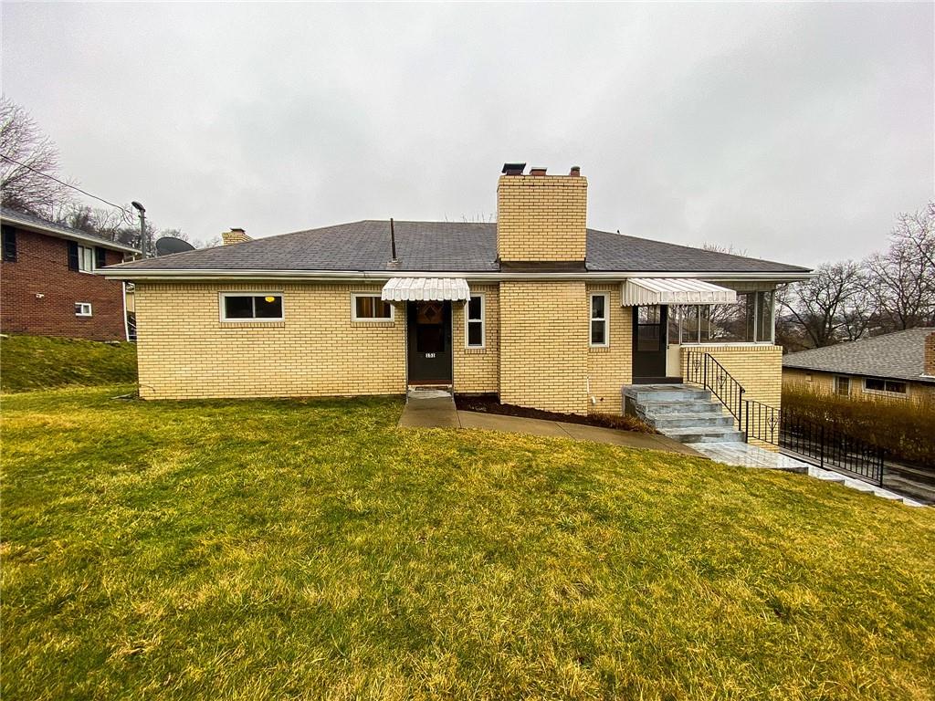 151 Thorne Road Washington, PA 15301 - Photo 1 of 25 a house view with a backyard space