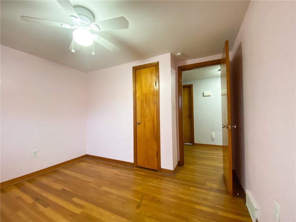151 Thorne Road Washington, PA 15301 - Photo 18 of 25 a view of empty room with wooden floor