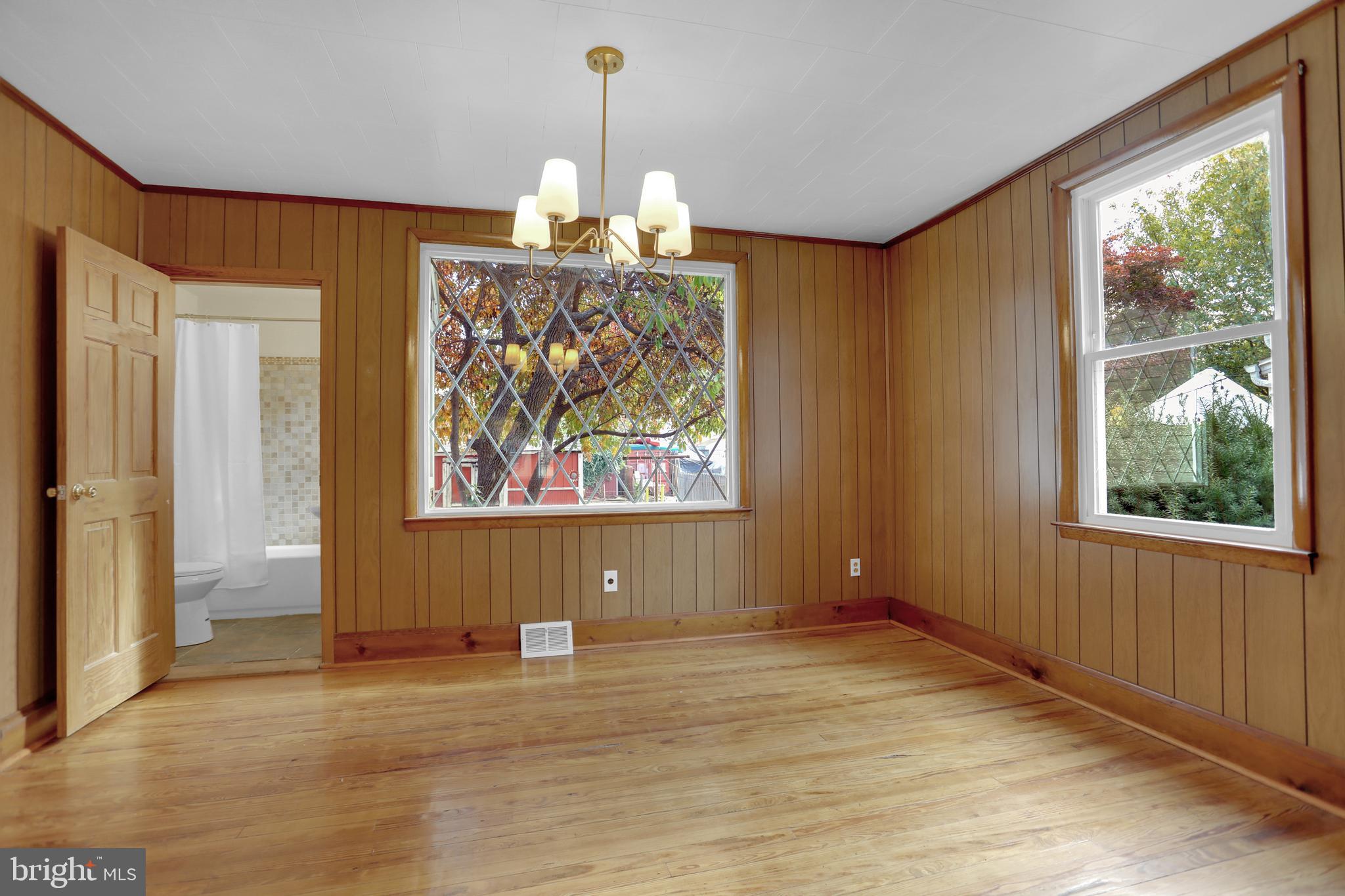 41 Township Road Dundalk, MD 21222 - Photo 12 of 40 a view of a room with window wooden floor and front door