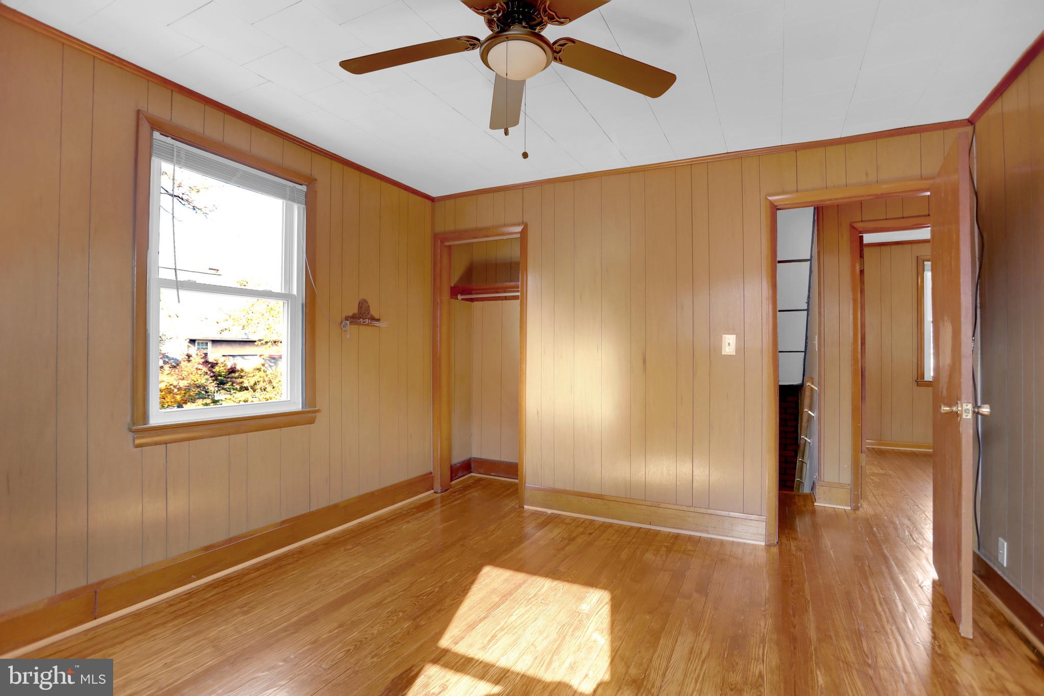 41 Township Road Dundalk, MD 21222 - Photo 18 of 40 a view of livingroom with hardwood floor and a ceiling fan