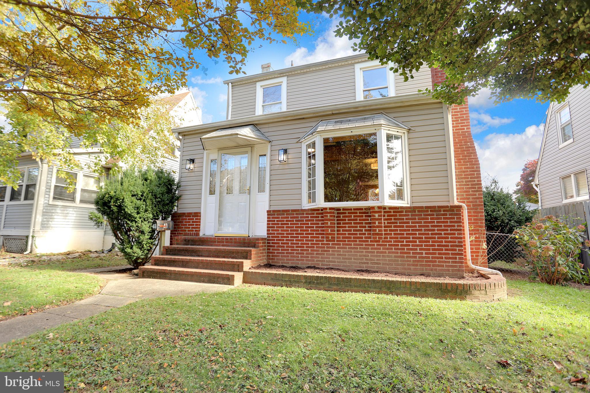 41 Township Road Dundalk, MD 21222 - Photo 2 of 40 a front view of a house with a yard