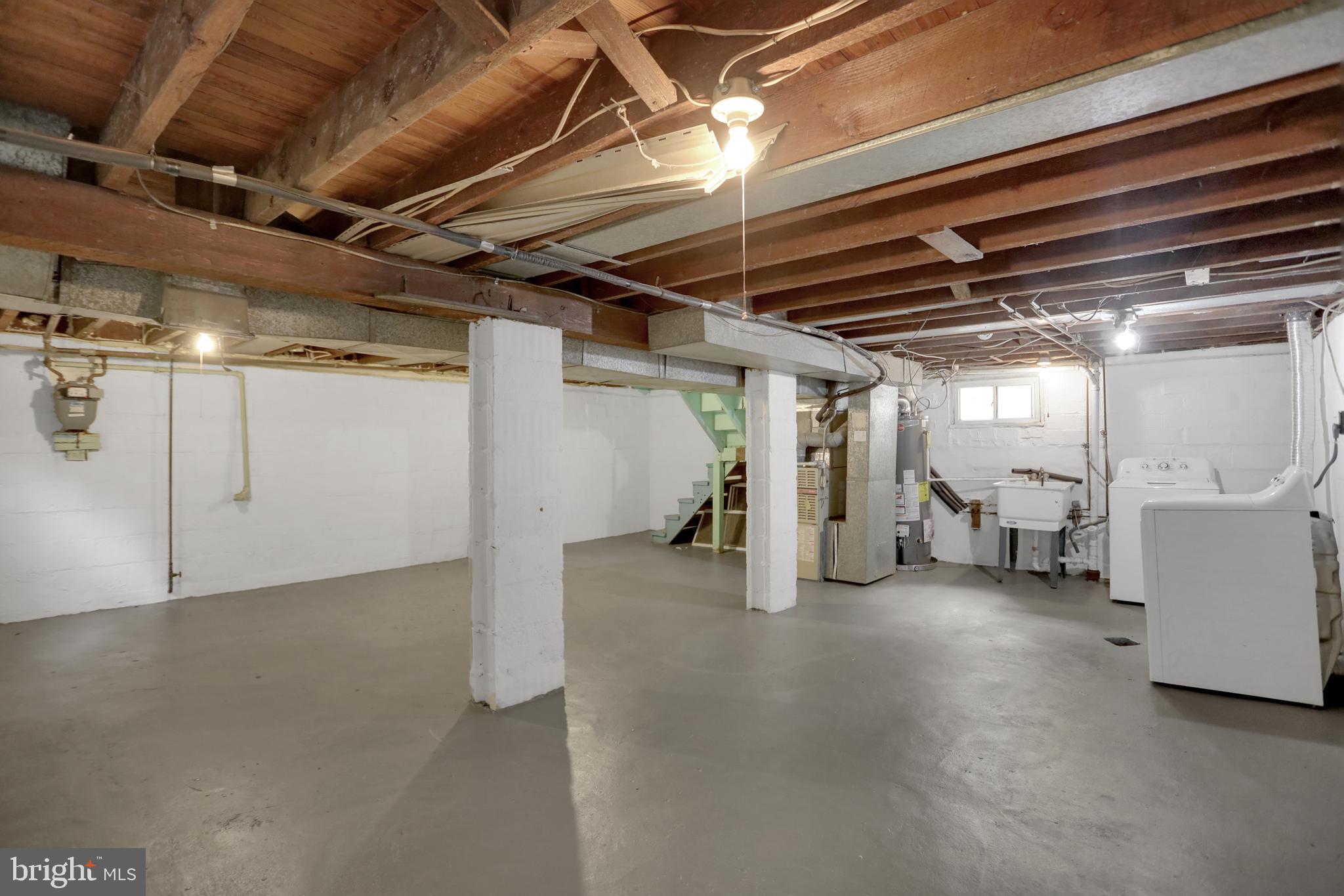 41 Township Road Dundalk, MD 21222 - Photo 29 of 40 a view of empty room with wooden ceiling