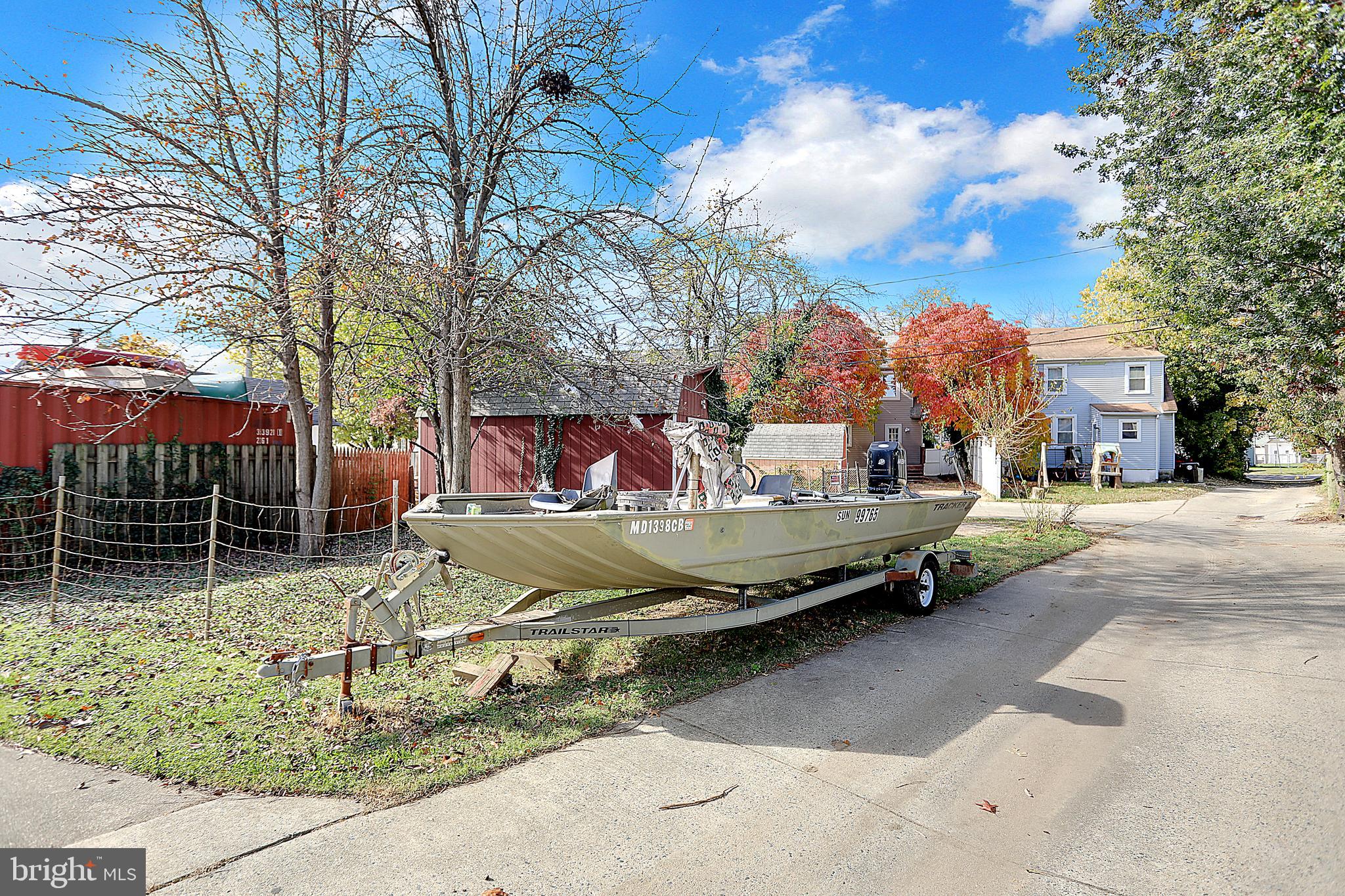 41 Township Road Dundalk, MD 21222 - Photo 37 of 40 a view of backyard with table and chairs and potted plants