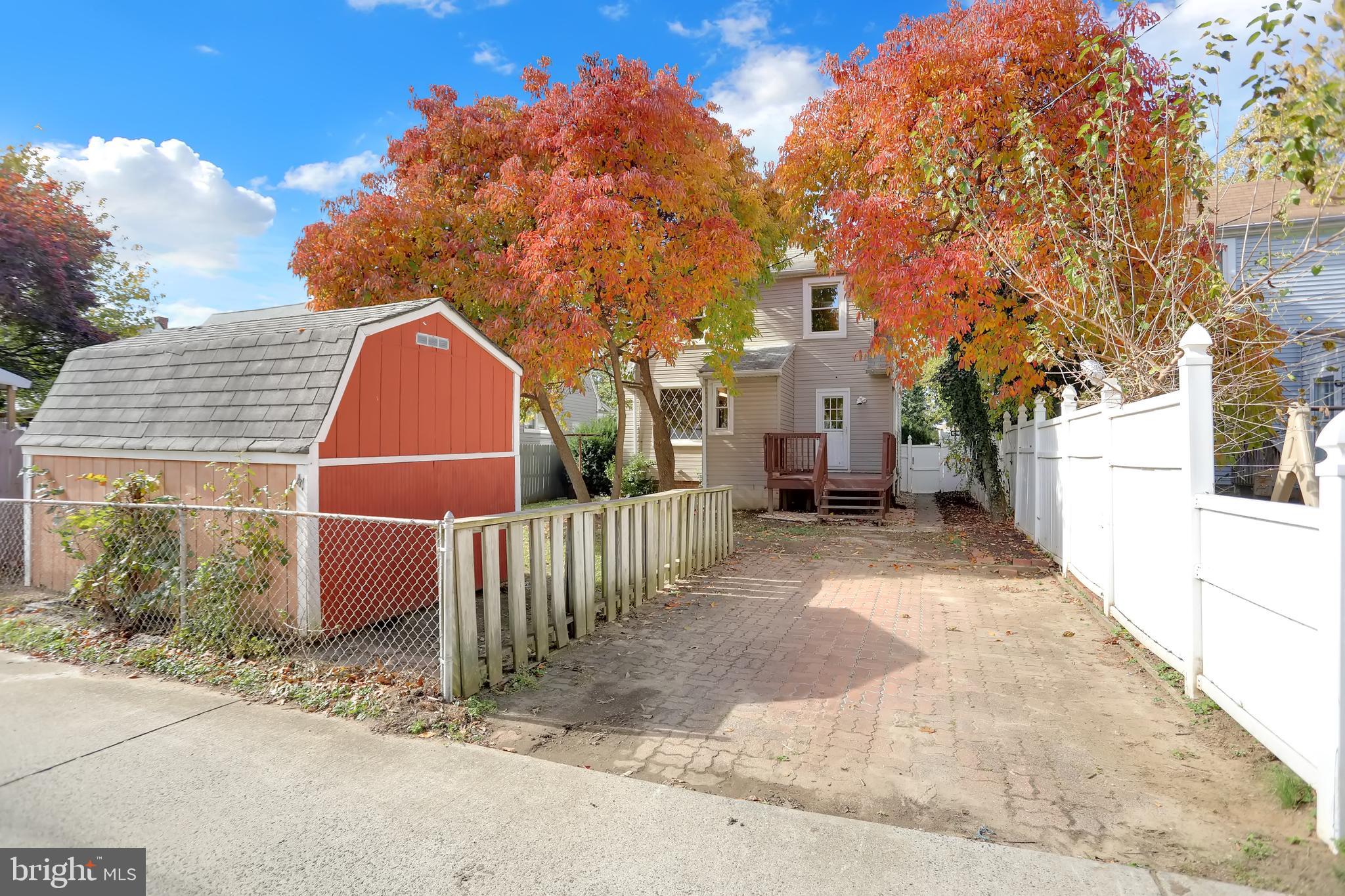 41 Township Road Dundalk, MD 21222 - Photo 38 of 40 a view of a brick house with a large trees