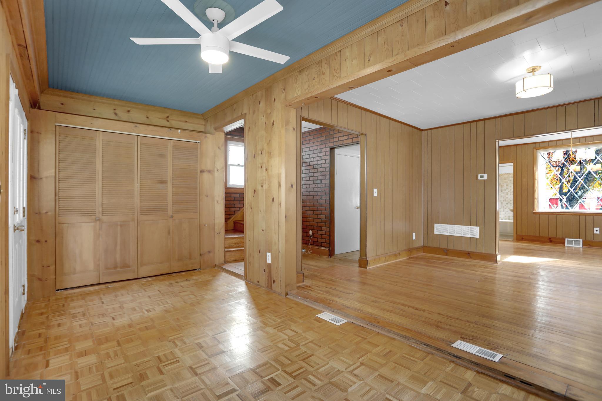 41 Township Road Dundalk, MD 21222 - Photo 7 of 40 a view of a hallway with wooden floor