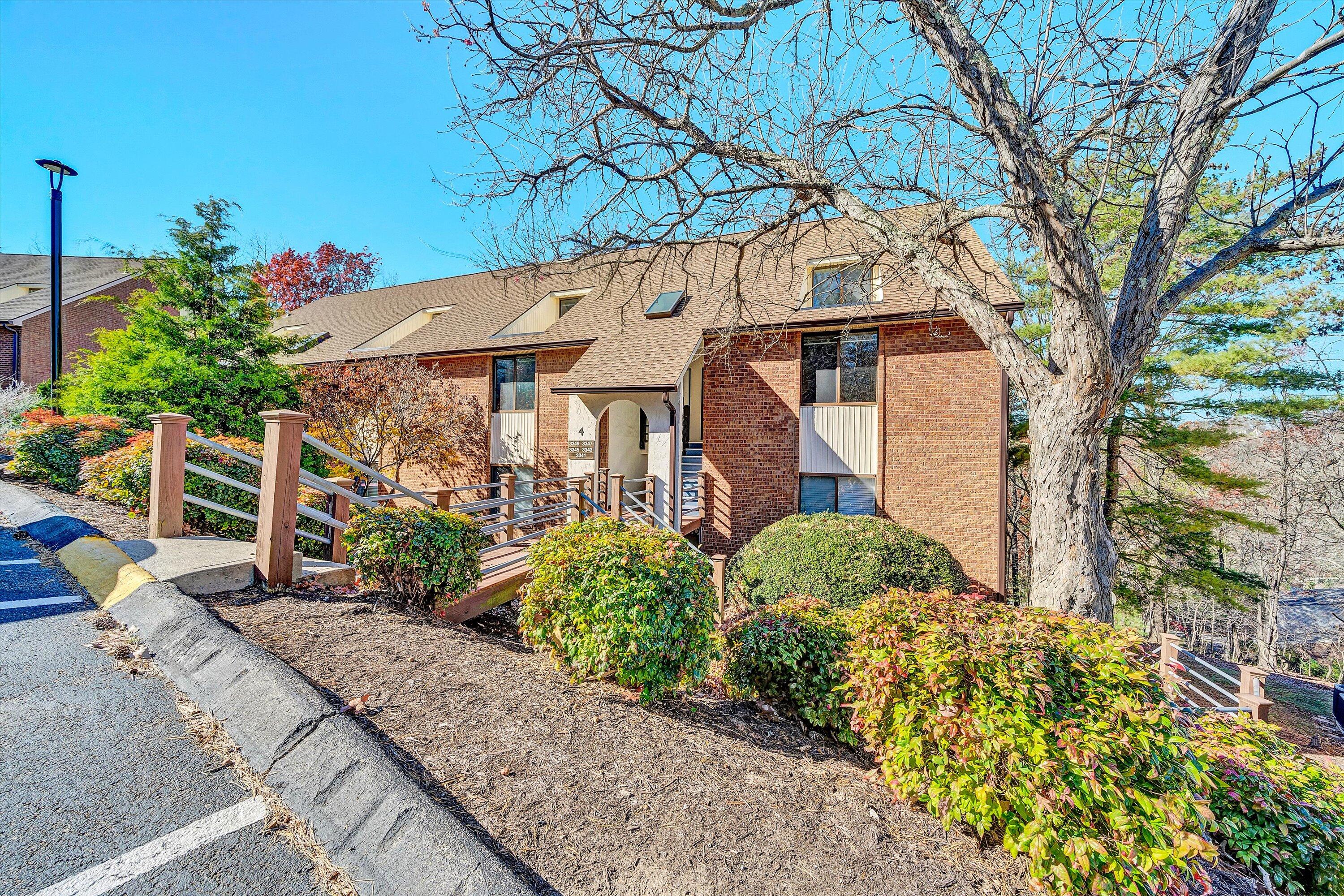 3347 Forest Ridge Road Roanoke, VA 24018 - Photo 3 of 22 a front view of a house with a yard