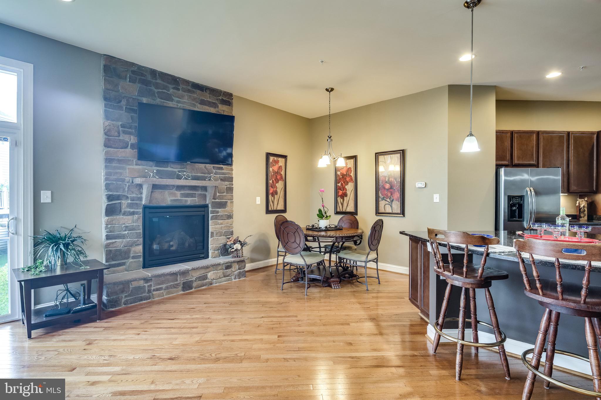 9846 Garden Ranges Laurel, MD 20723 - Photo 6 of 31 Main Level Breakfast Area with Fireplace