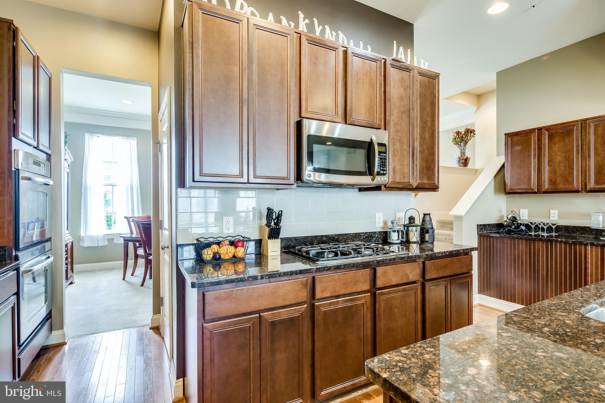 9846 Garden Ranges Laurel, MD 20723 - Photo 8 of 31 Kitchen with Updated Appliances & Backsplash