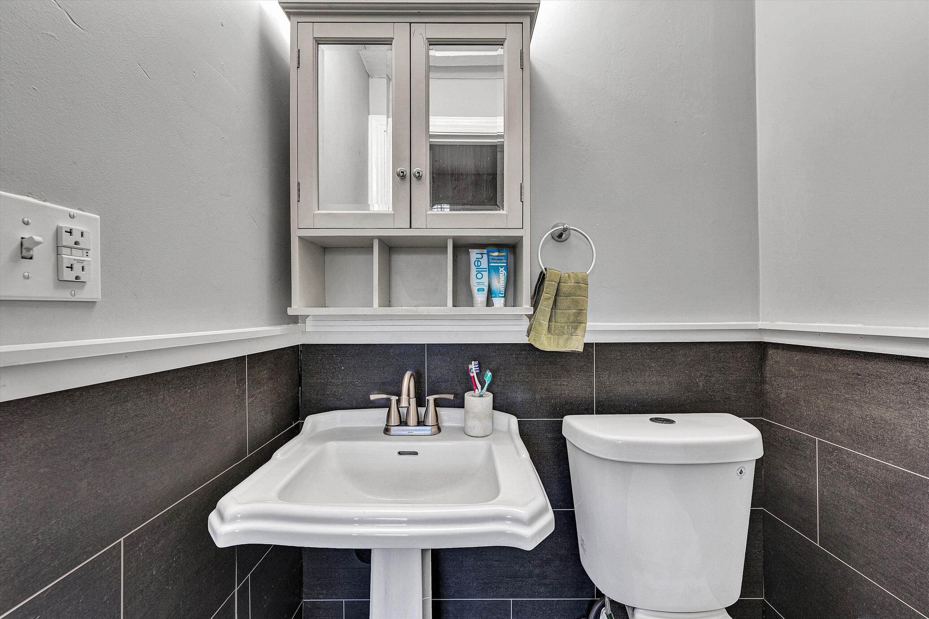 2238 Houston Mines Road Troutville, VA 24175 - Photo 22 of 36 a bathroom with a sink a toilet and a mirror
