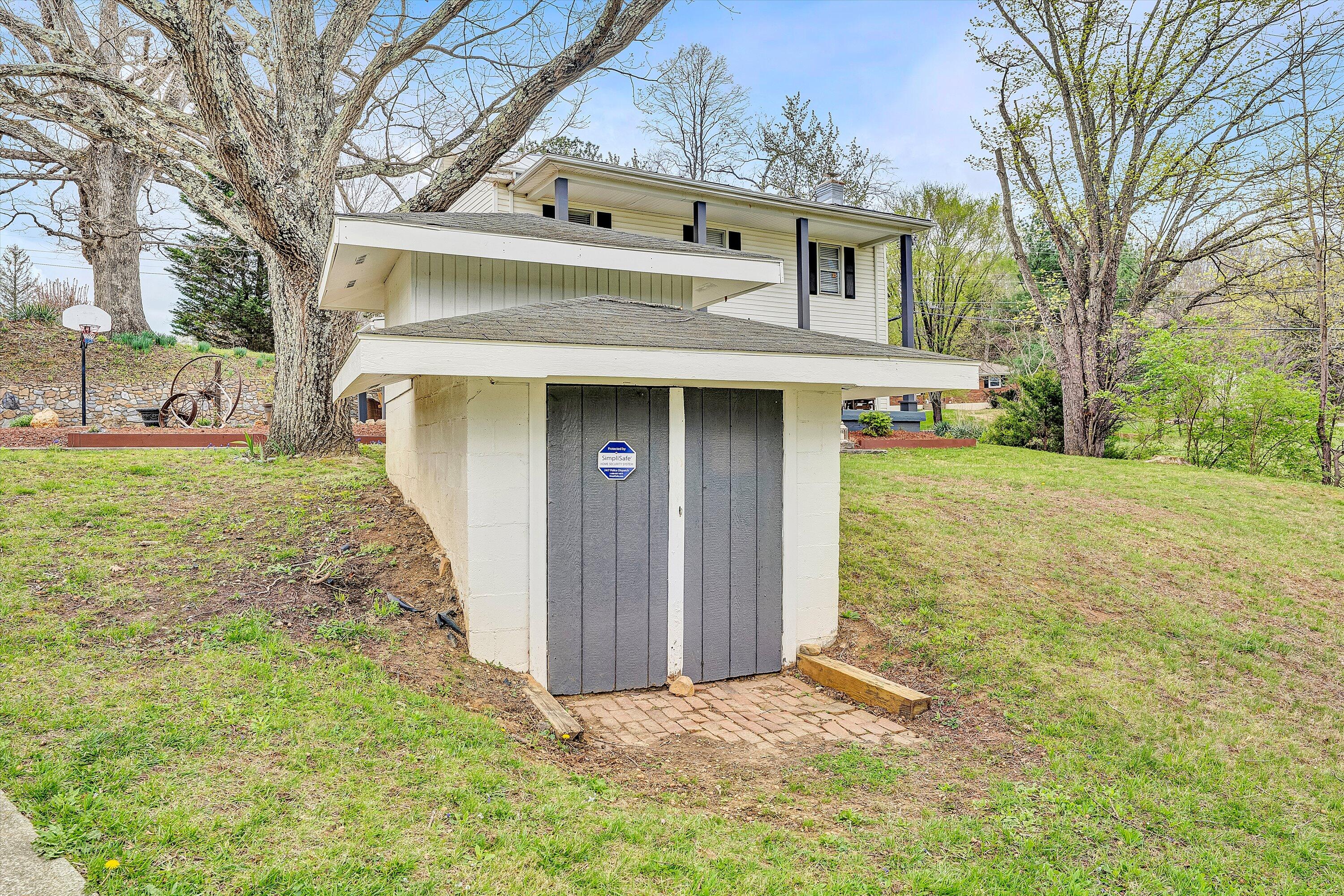 2238 Houston Mines Road Troutville, VA 24175 - Photo 25 of 36 a view of a house with a big yard and large tree