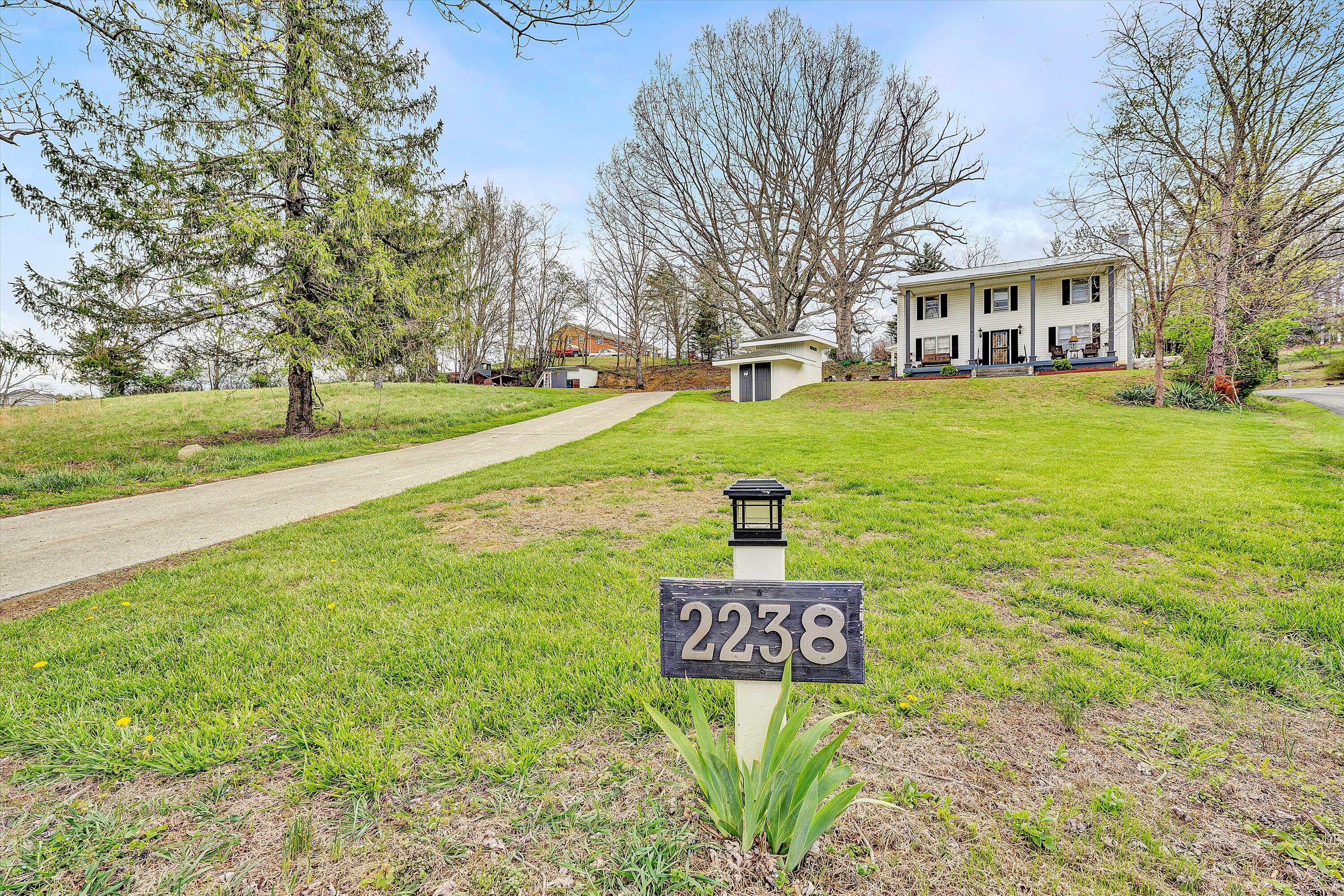 2238 Houston Mines Road Troutville, VA 24175 - Photo 27 of 36 a sign board on the side of the road