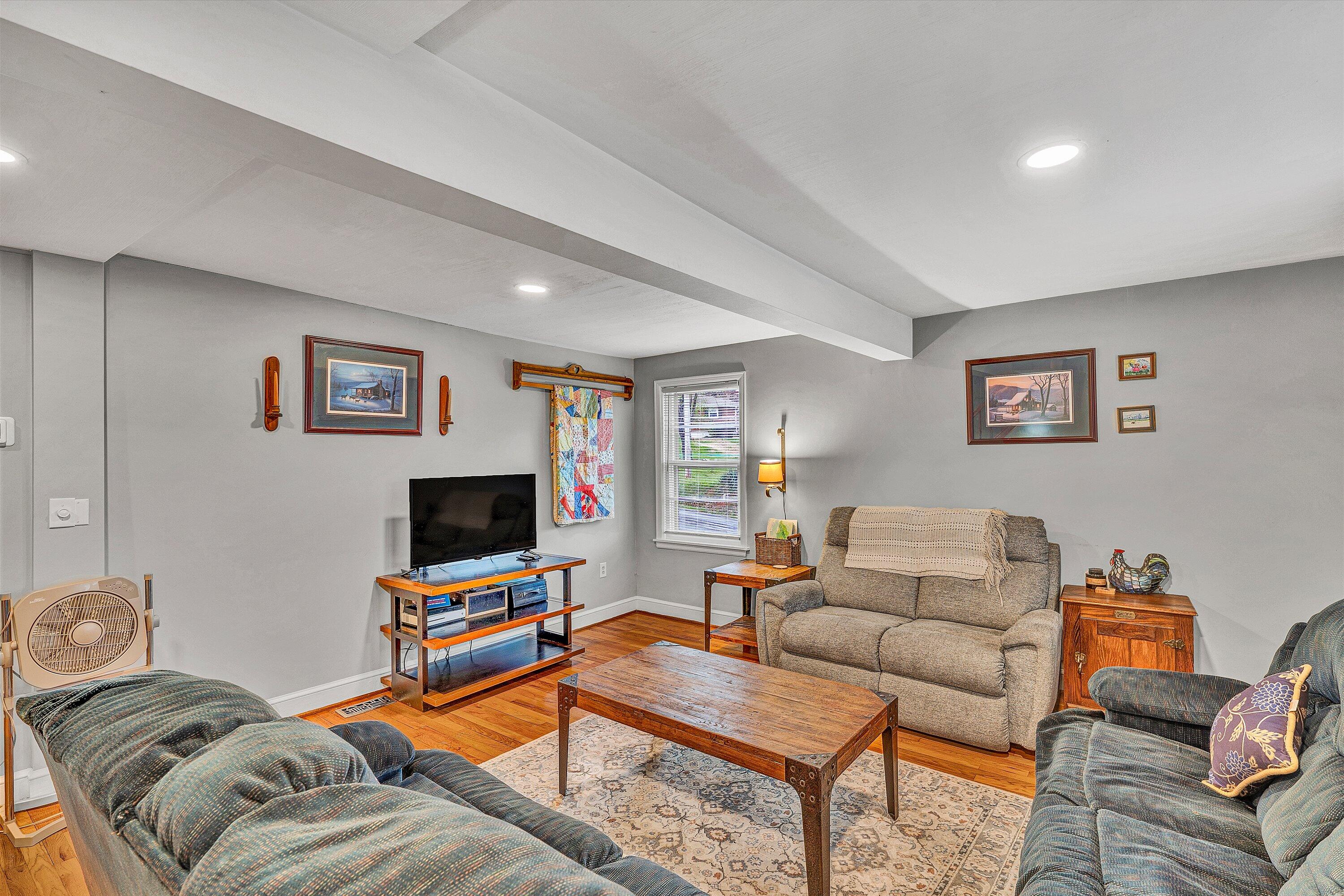 2238 Houston Mines Road Troutville, VA 24175 - Photo 7 of 36 a living room with furniture and a flat screen tv