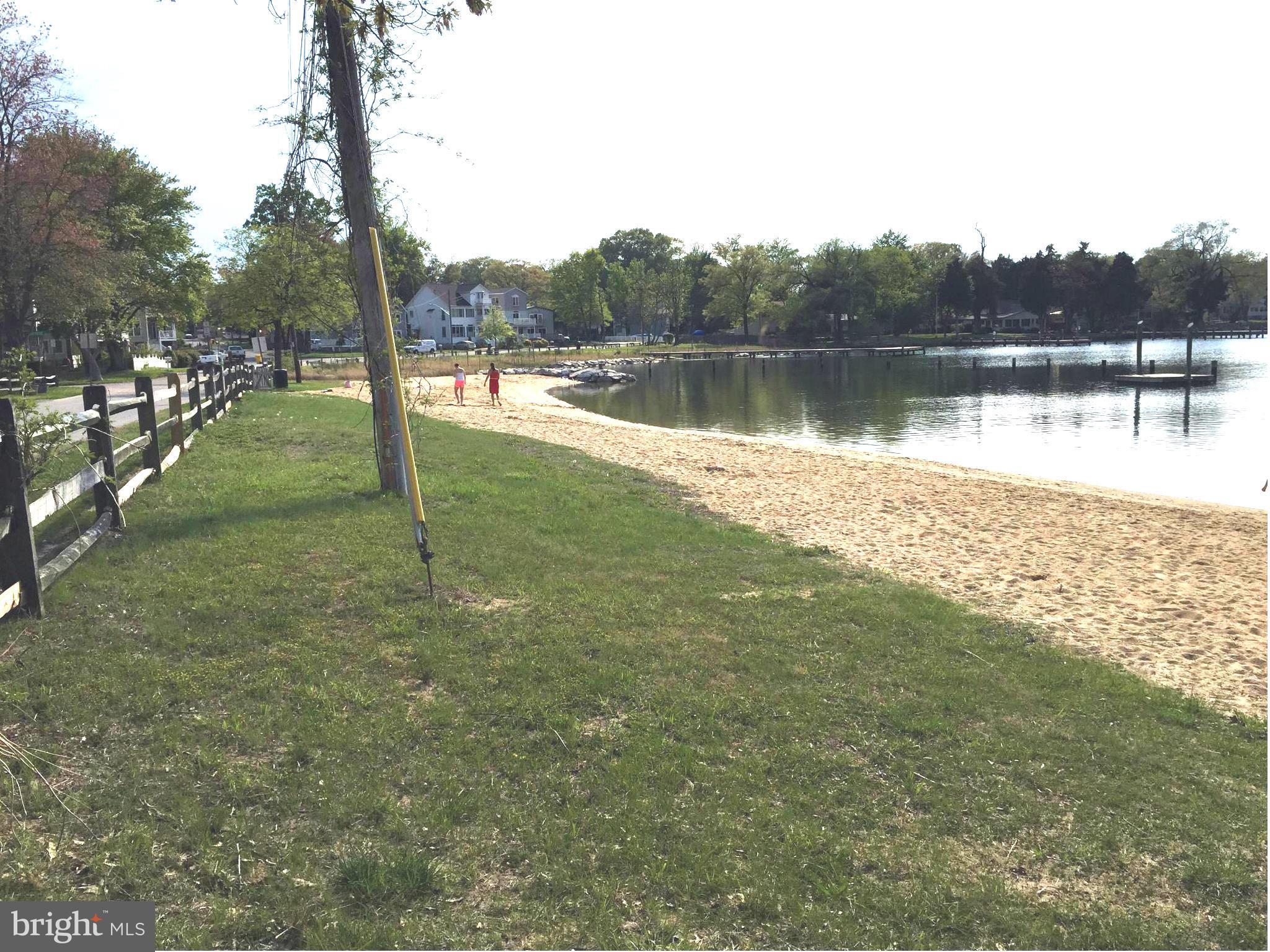 1539 Mayfield Road Edgewater, MD 21037 - Photo 12 of 17 a view of a lake with houses in the back