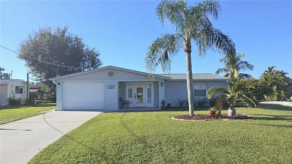a view of a yard in front of a house