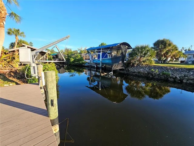 a view of water pond with boats