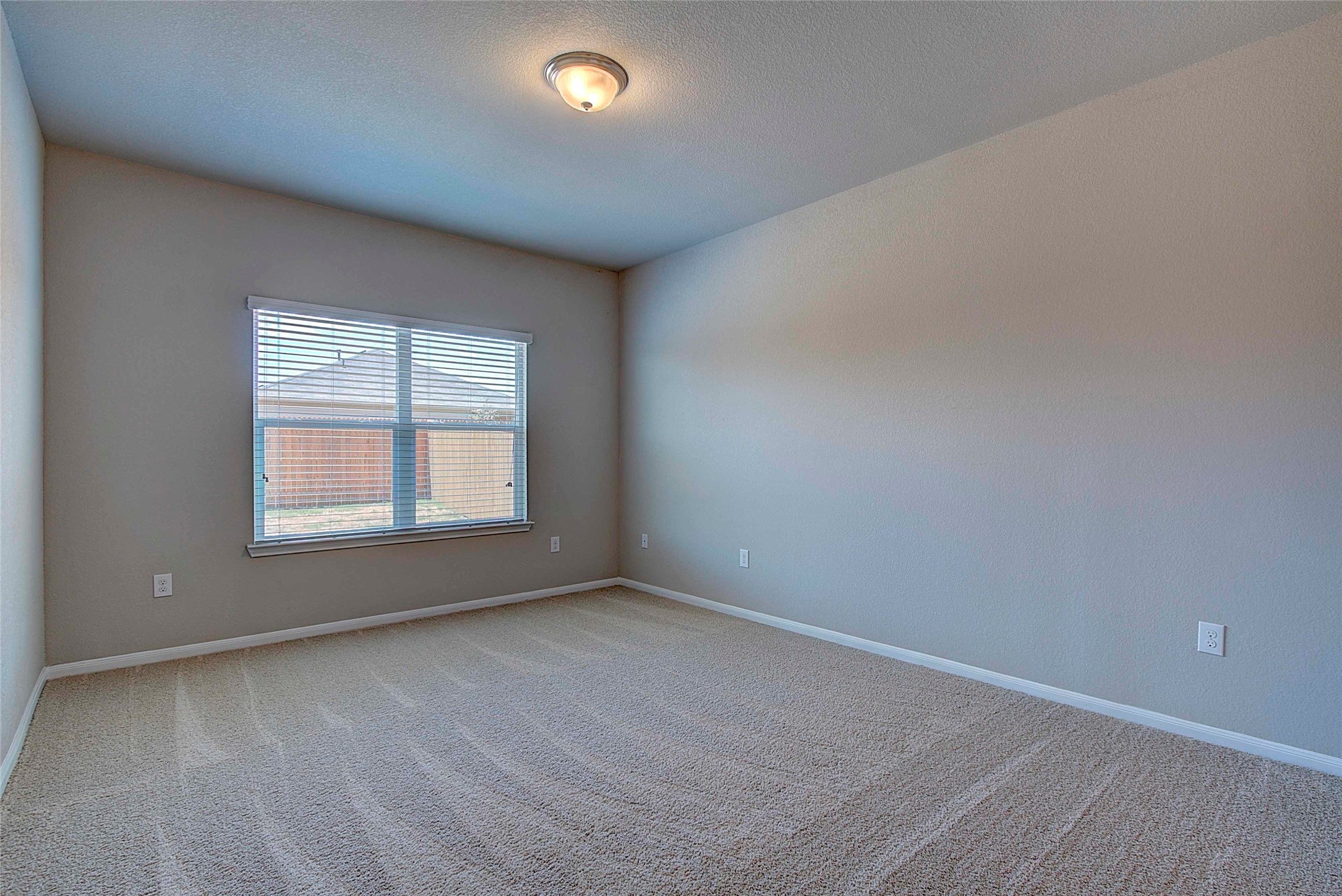10404 Hatton Lane Austin, TX 78754 - Photo 12 of 27 an empty room with a window