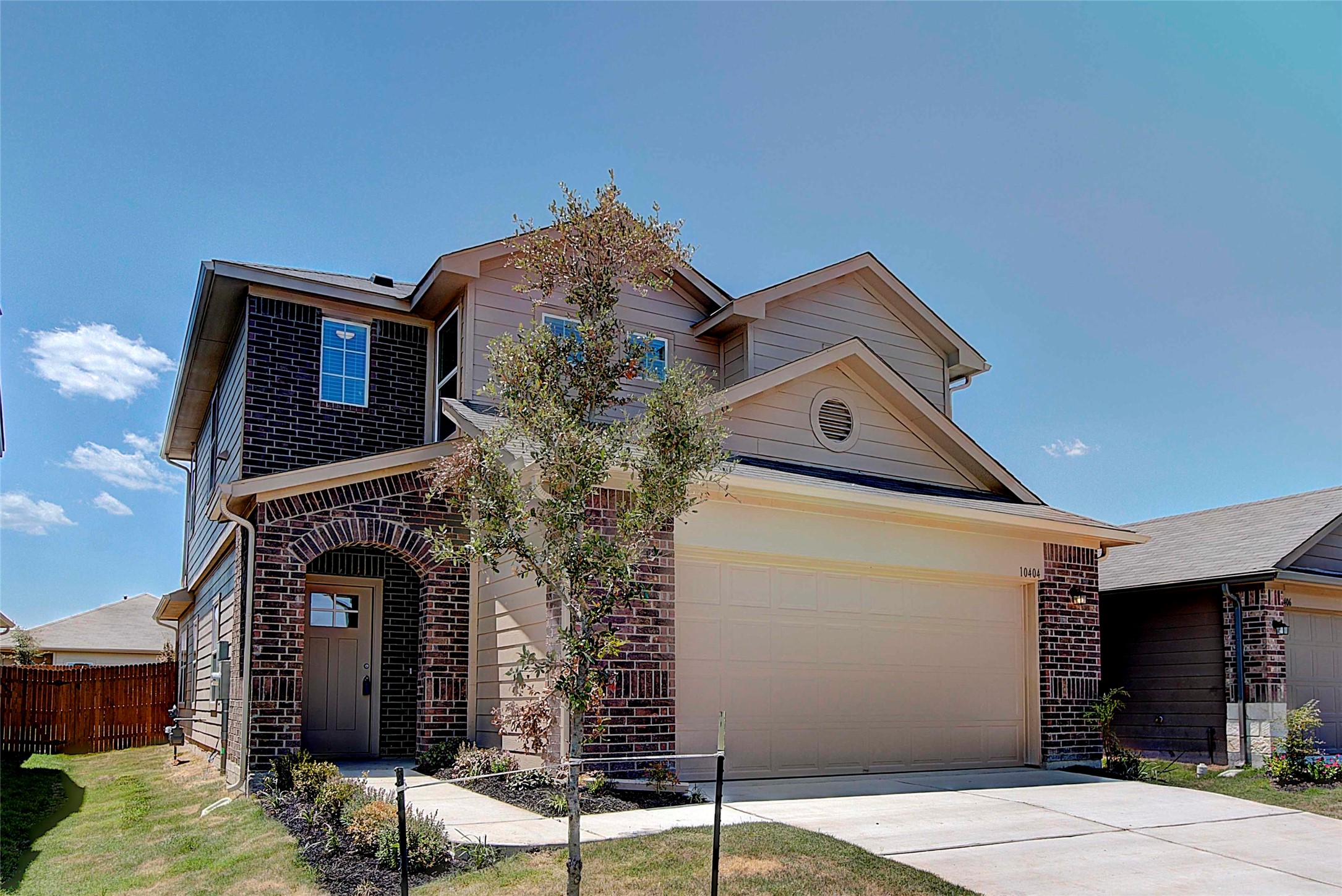 10404 Hatton Lane Austin, TX 78754 - Photo 2 of 27 a front view of a house with parking space