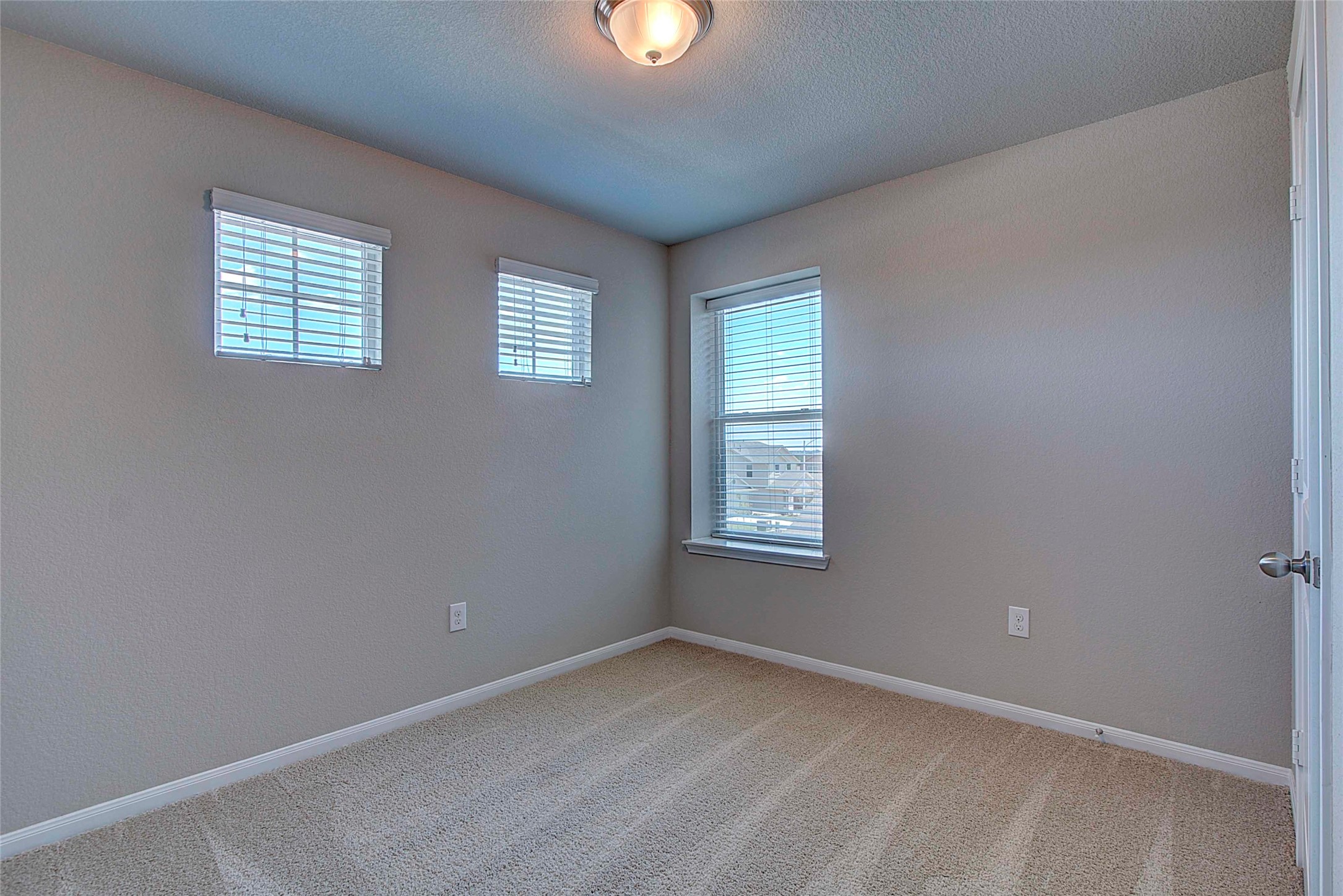 10404 Hatton Lane Austin, TX 78754 - Photo 22 of 27 an empty room with a window