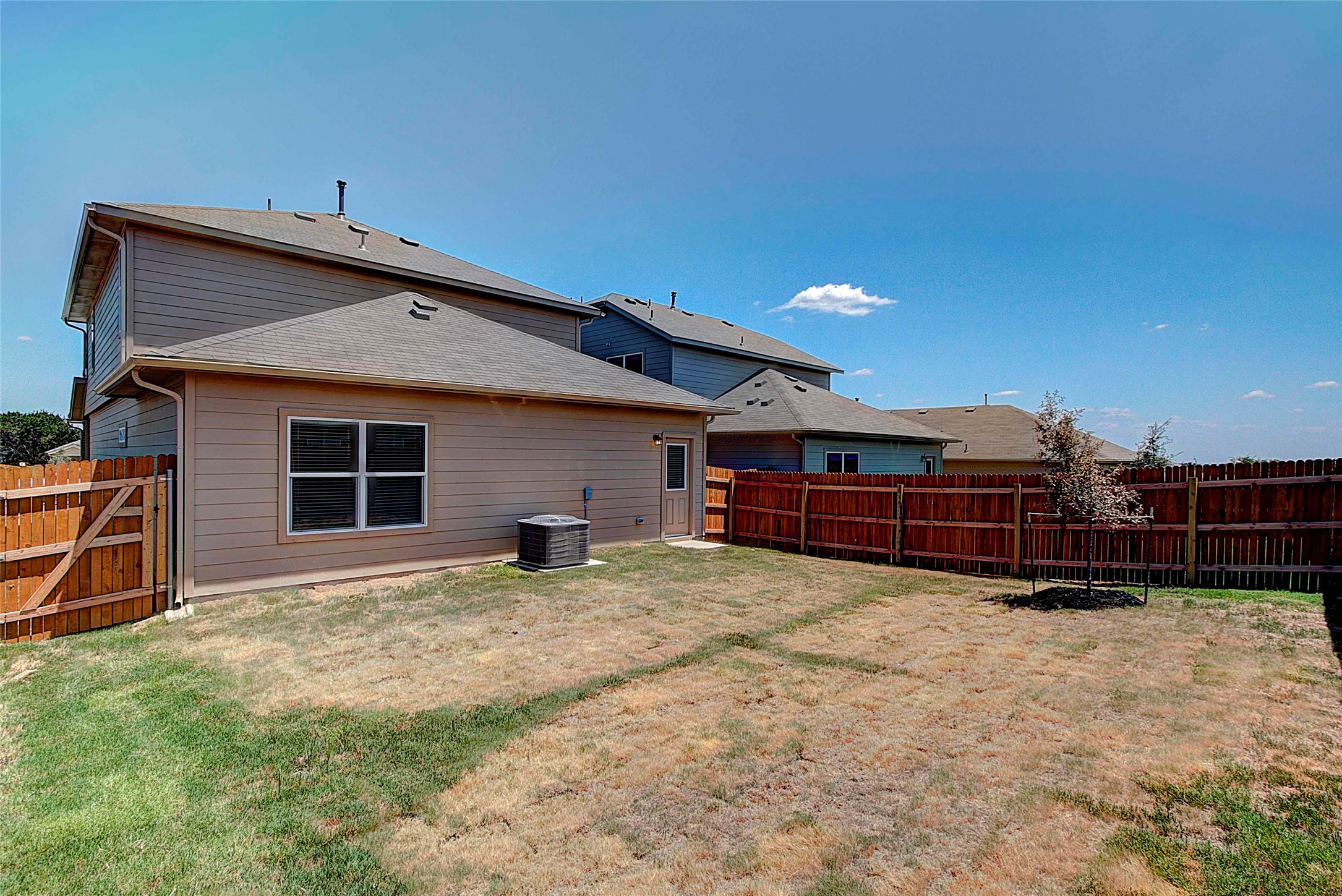 10404 Hatton Lane Austin, TX 78754 - Photo 26 of 27 a view of a house with wooden fence