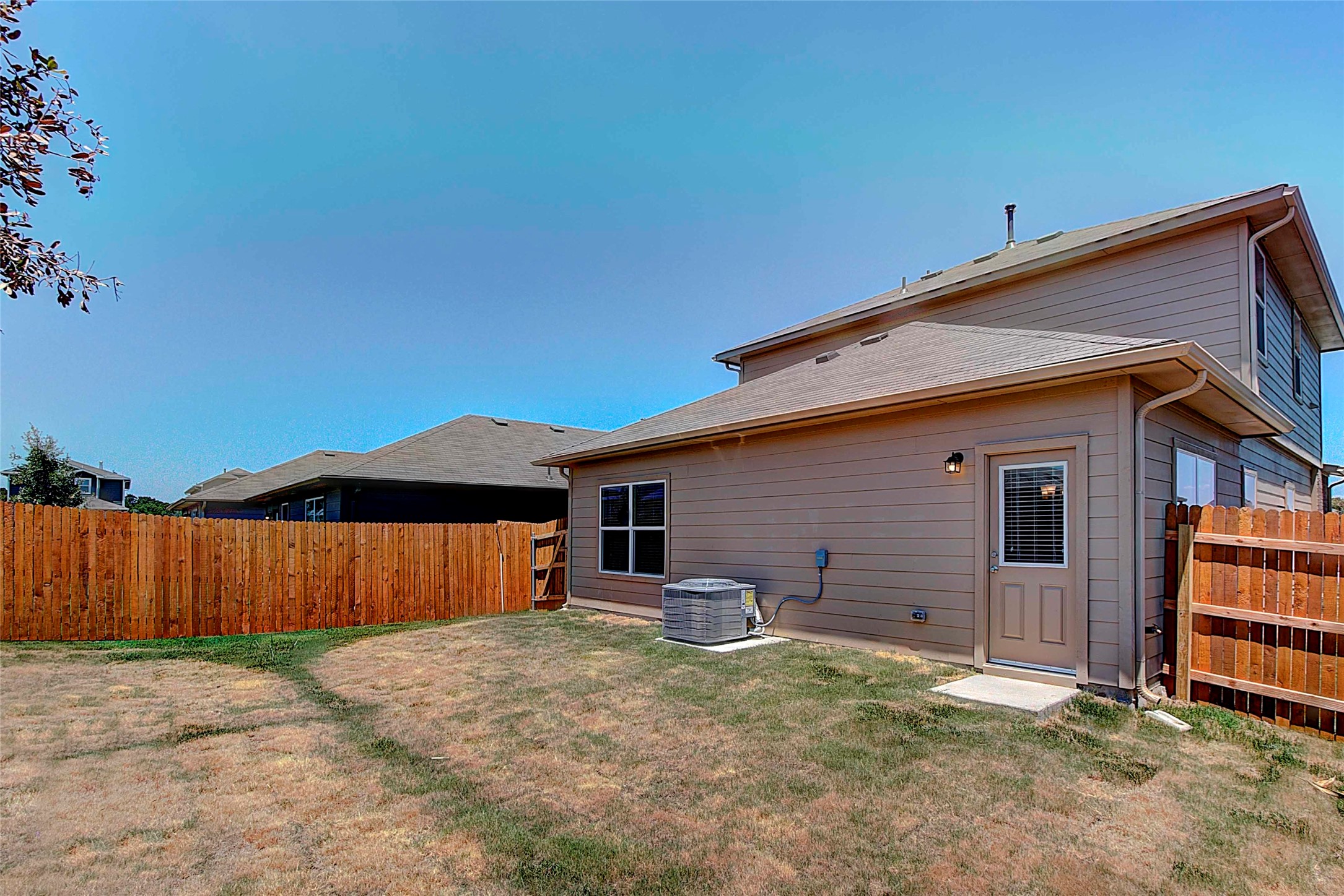 10404 Hatton Lane Austin, TX 78754 - Photo 27 of 27 a backyard of a house with table and chairs