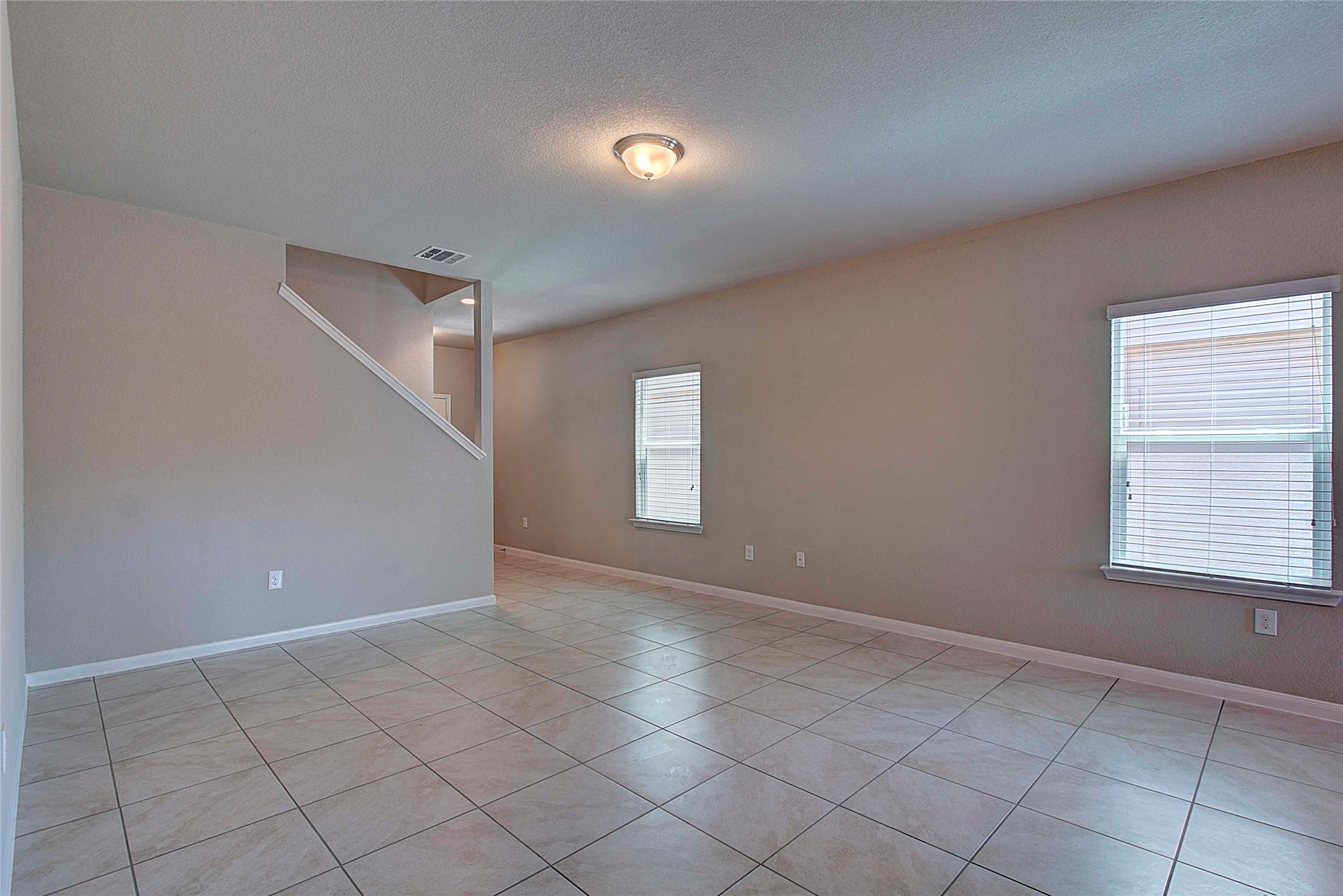 10404 Hatton Lane Austin, TX 78754 - Photo 6 of 27 an empty room with windows