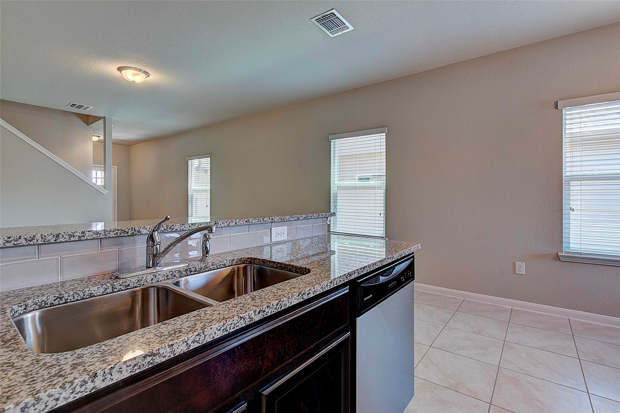 10404 Hatton Lane Austin, TX 78754 - Photo 8 of 27 a kitchen with a sink and cabinets