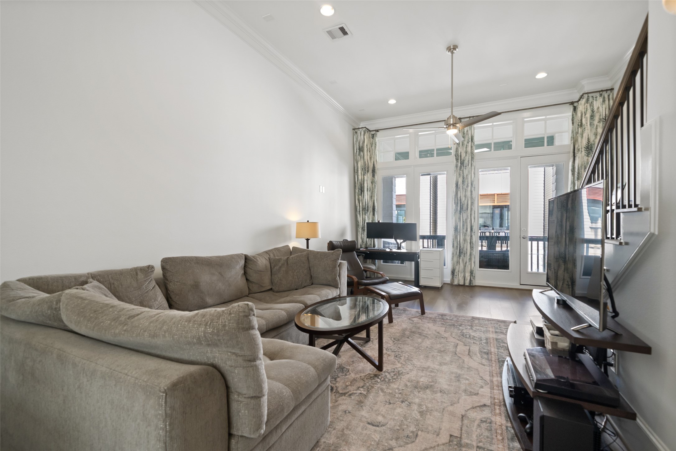 3307 Timbergrove Oaks Street Houston, TX 77008 - Photo 15 of 33 a living room with furniture and a flat screen tv