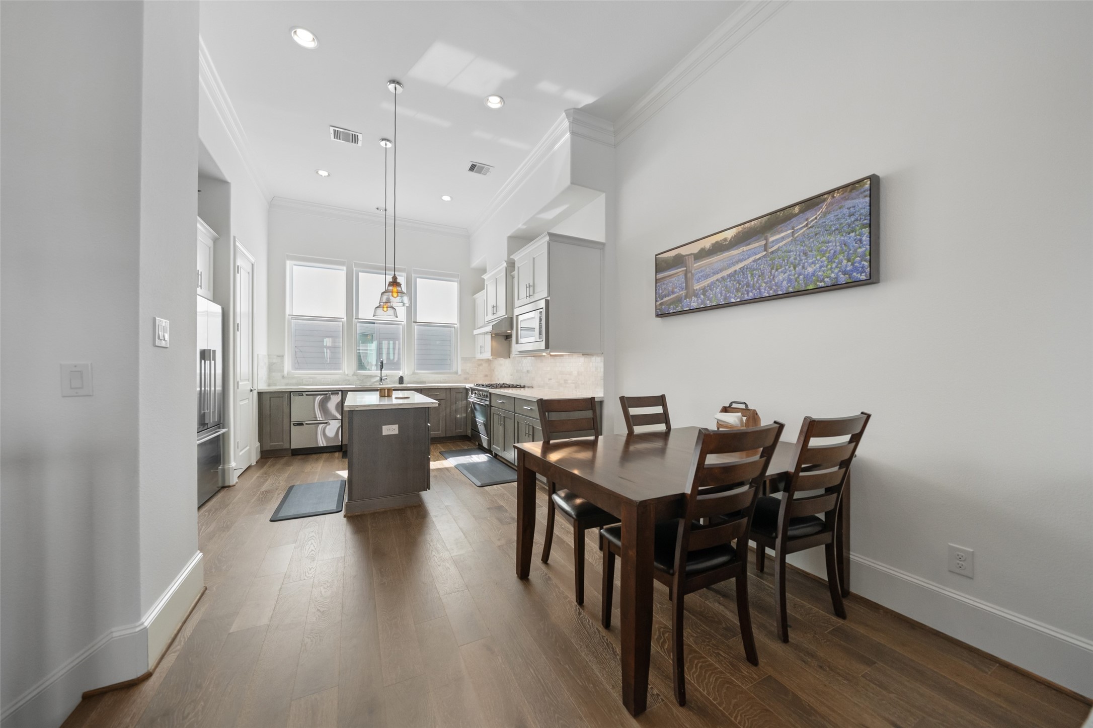 3307 Timbergrove Oaks Street Houston, TX 77008 - Photo 10 of 33 a view of a dining room with furniture and wooden floor