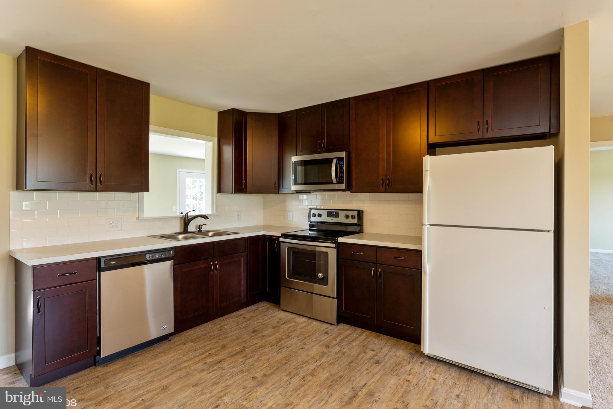 4335 Blink Horn Road Hurlock, MD 21643 - Photo 8 of 24 Kitchen with Pass thru to family room