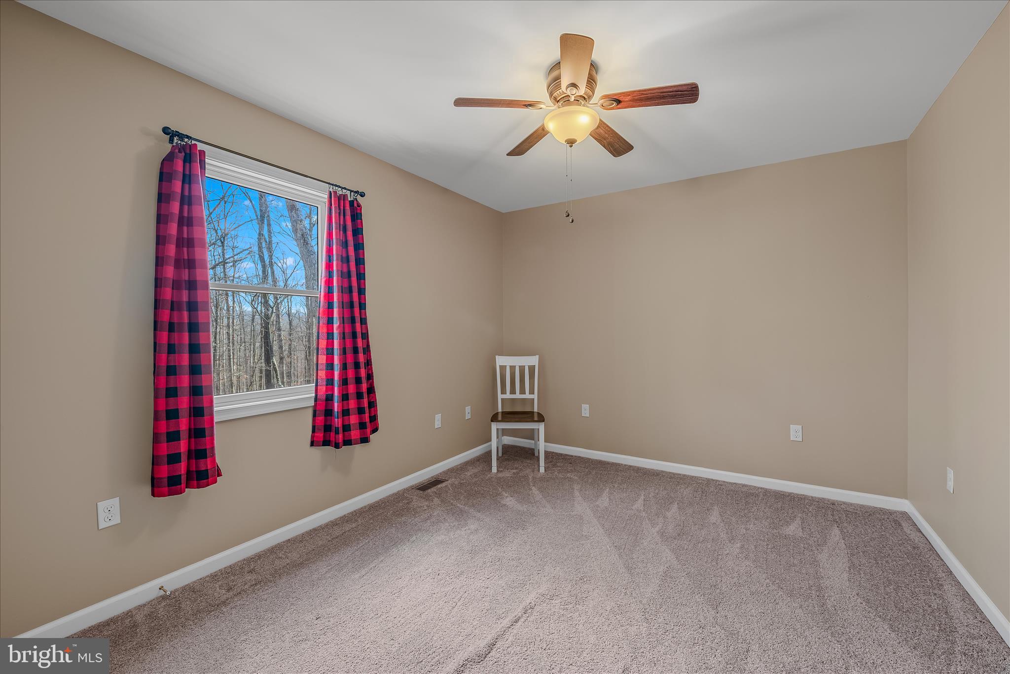 2910 Milo School Road Great Cacapon, WV 25422 - Photo 21 of 55 a view of a workspace with furniture and a window