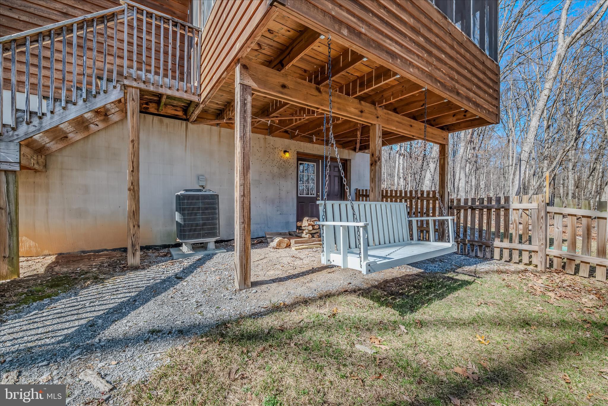 2910 Milo School Road Great Cacapon, WV 25422 - Photo 30 of 55 a view of a backyard with wooden fence